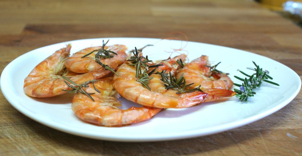 Langostinos a la papillote de romero